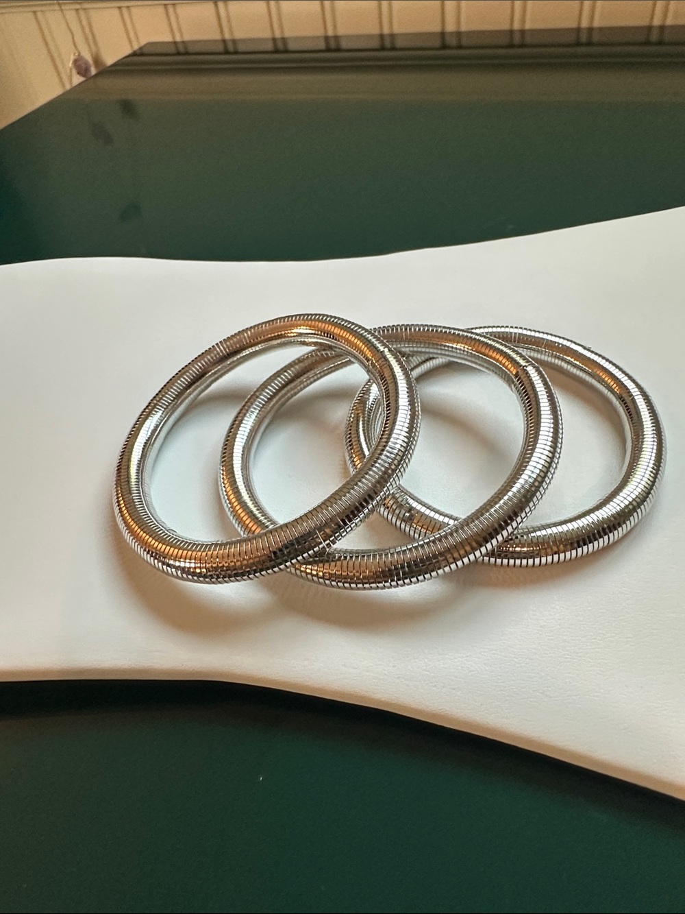 Set of Three Silver Coil Bangle Bracelets